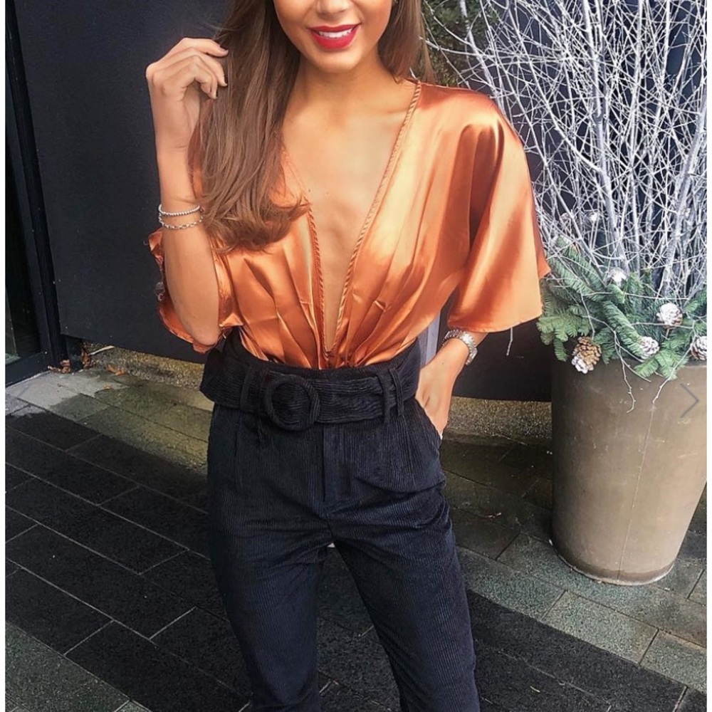 Burnt orange bodysuit